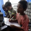 Varios niños, durante una clase.