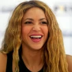 Shakira rie durante una rueda de prensa.