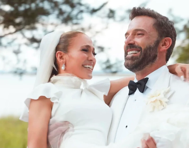 La pareja, sonriente, el día de su boda en julio de 2022