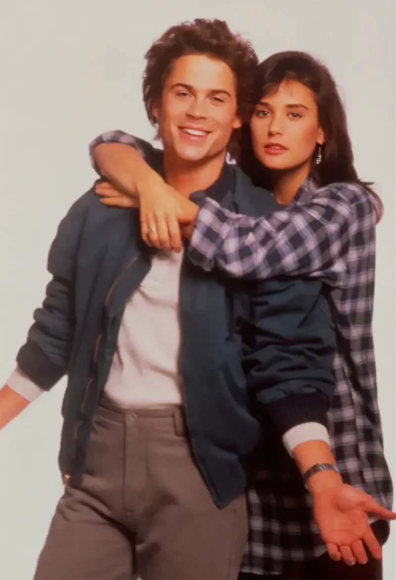 Rob Lowe y Demi Moore jóvenes.