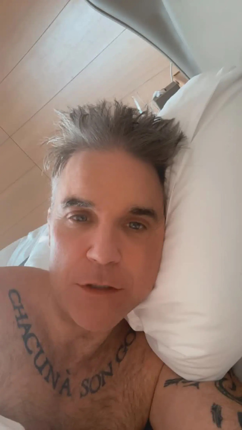 Robbie Williams en la cama