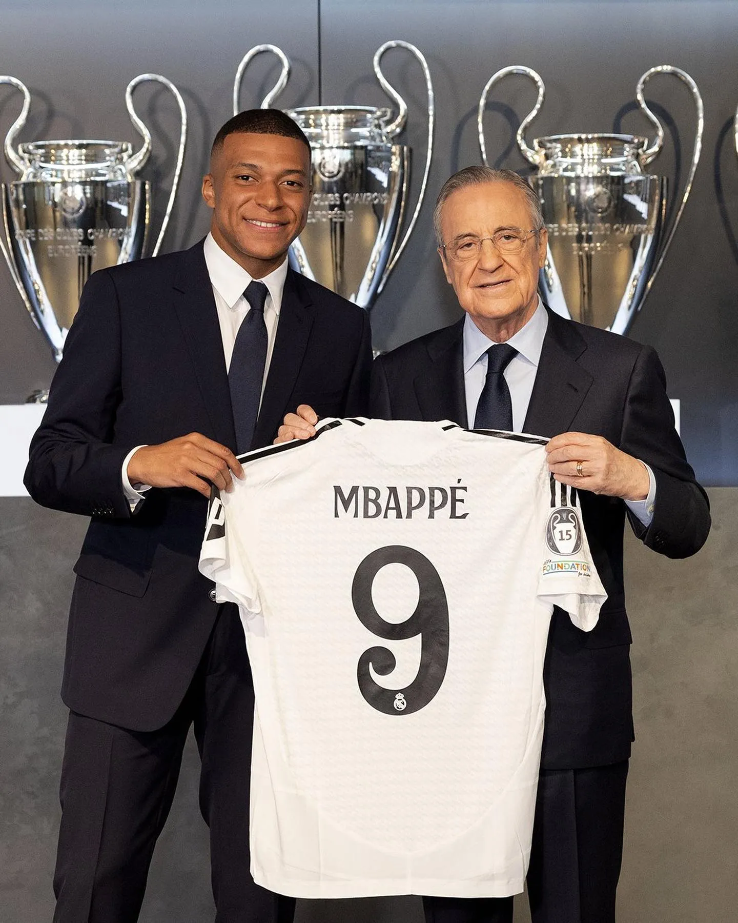 Mbappé con Florentino Pérez.