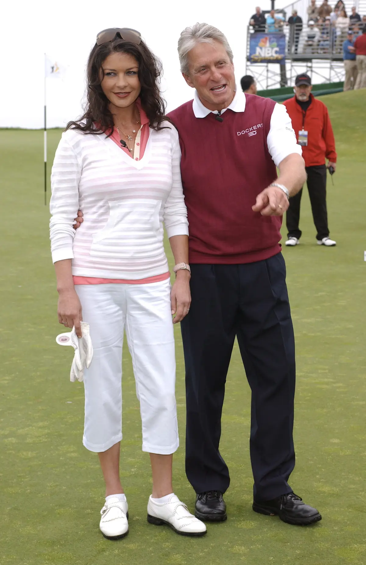 Catherine y Michael en un campo de golf